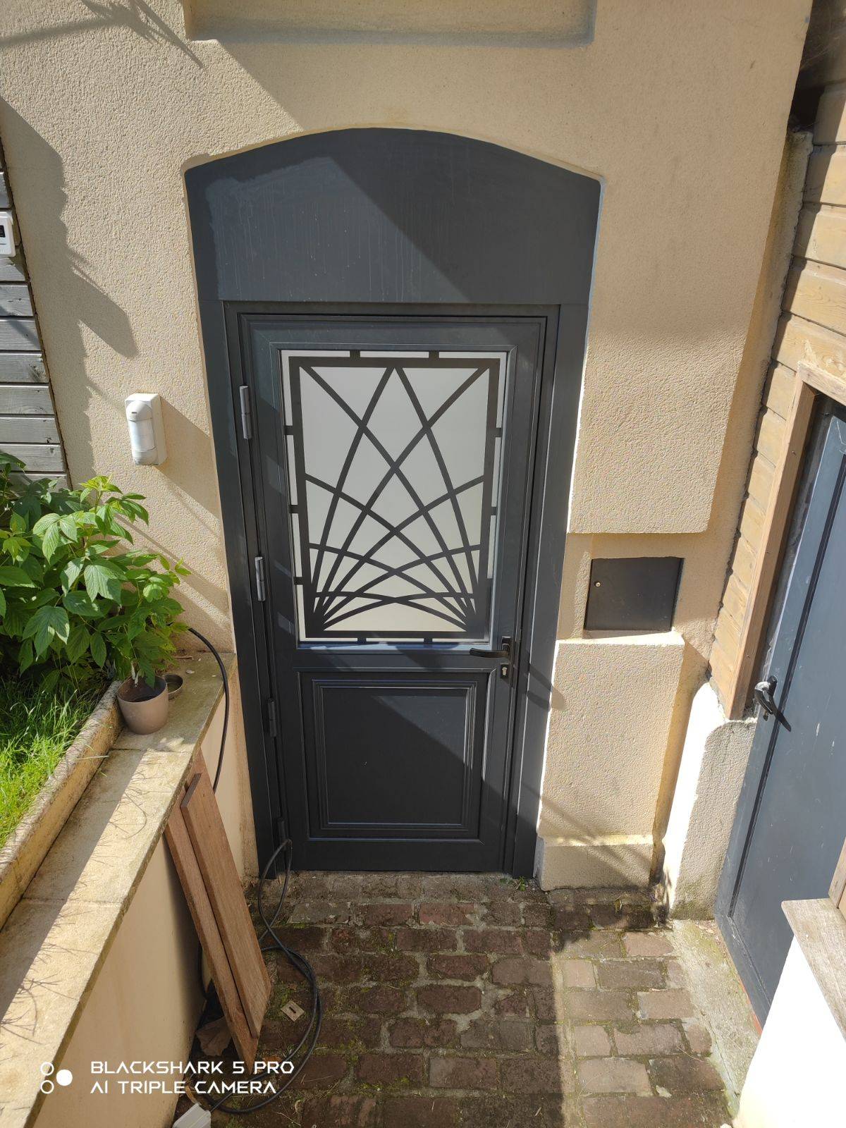 Création sur mesure d'une porte d'entrée en vitrée au Havre